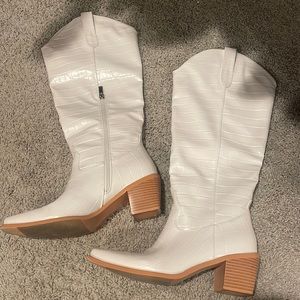Tall white cowboy boots, size 7.5.